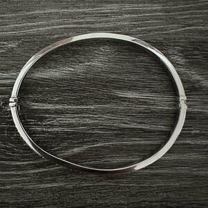 Diamond accented bangle and matching earrings